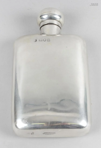 An Edwardian silver hip flask, the body of plain oblong