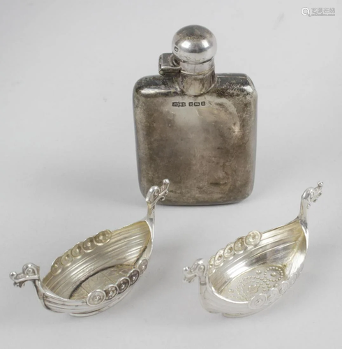 A group of assorted small silver novelty items,