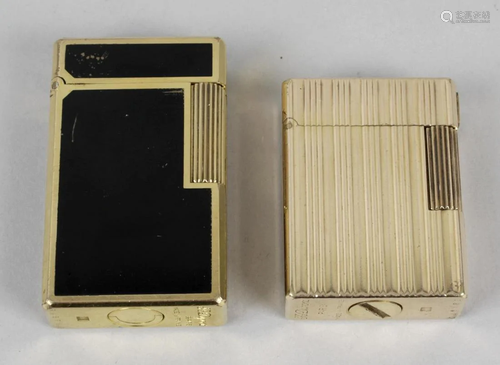 A gold S T Dupont cigarette lighter, of rectangu…