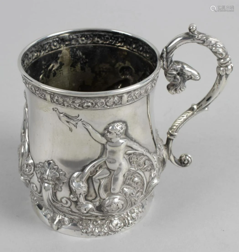 An Edwardian silver mug, of baluster form with s…