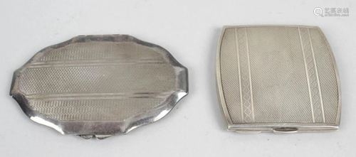 A mid-20th century silver cased compact, the sh…