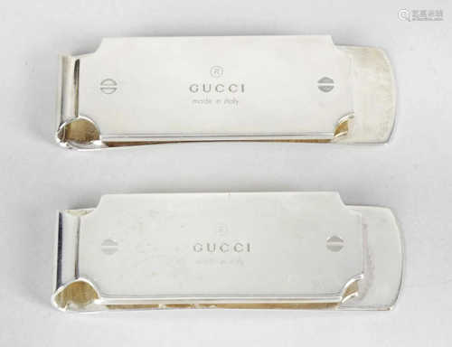 Two silver Gucci money clips, the canted fronts marked