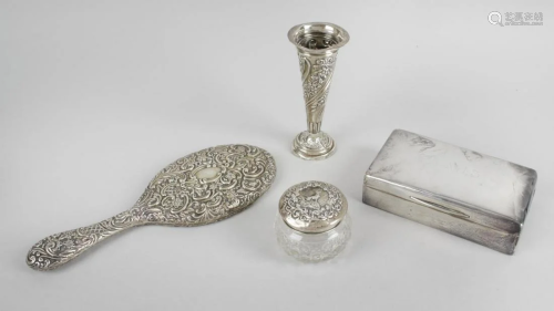 A small selection of silver items to include a table
