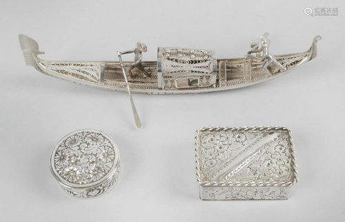 A miniature filigree model of a gondola, with ce…