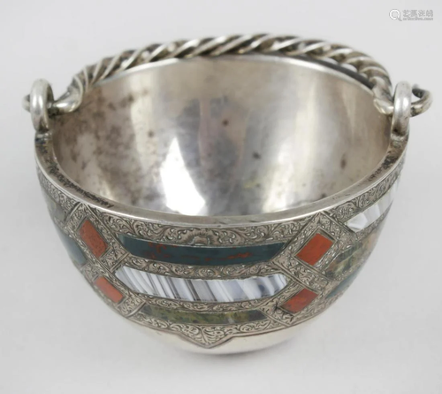 A small cup or bowl , probably Scottish, of tapering