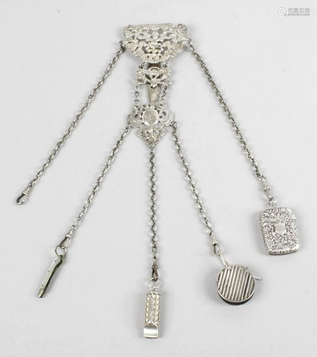 A Victorian silver chatelaine, the shaped and …