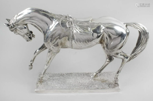 A modern silver filled figure modelled as a horse,