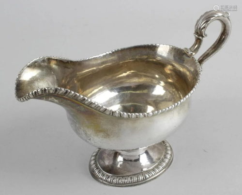 A late George II silver sauce boat, the oval ogee s…