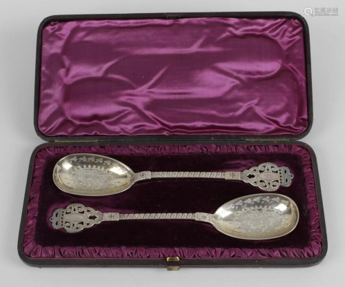 A pair of Victorian silver serving spoons, each ovoid