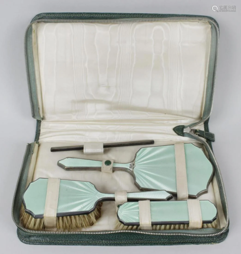 A 1930's silver and enamel part dressing table set,