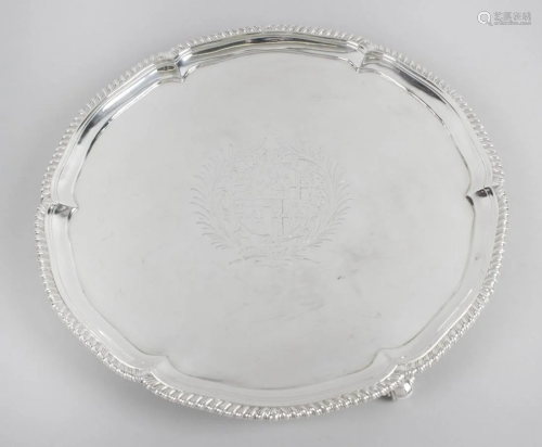 An early George III silver salver, the circular form