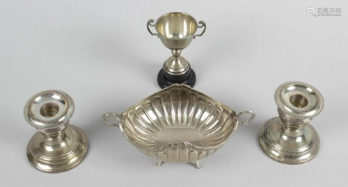 A small group of assorted silver items, comprisi…