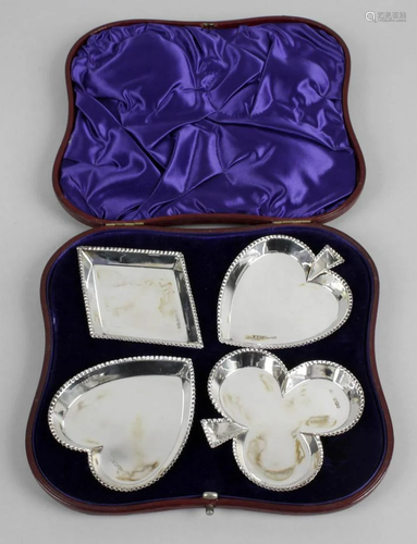 A set of four late Victorian silver dishes, each …