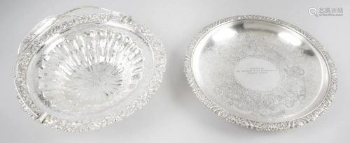 A silver plated swing-handle basket of circular foo…