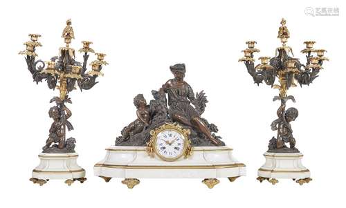 A gilt bronze and spelter clock garniture