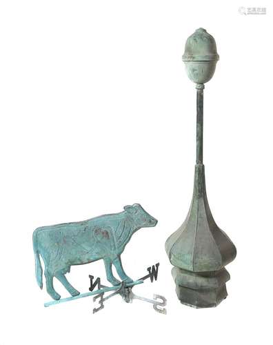 A verdigris copper weathervane modelled as a cow