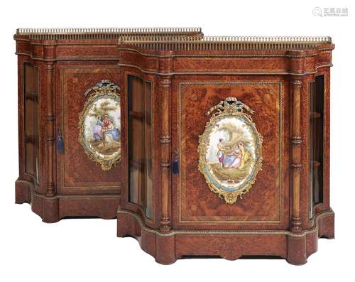 ϒ A pair of Napoleon III amboyna,tulipwood banded,porcelain inset & gilt metal mounted side cabinets