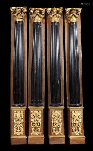 A set of four giltwood and ebonised pilasters