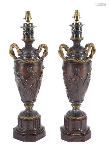 A pair of impressive French gilt and patinated bronze and marble mounted table lamps in Neo Grec tas