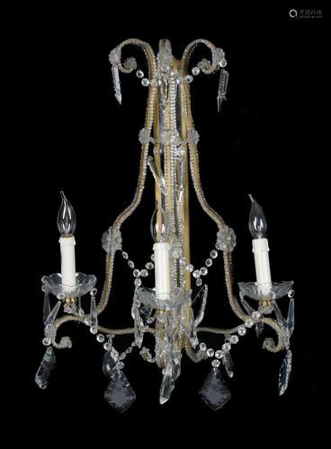 A pair of Continental, probably Italian, gilt metal and glass three light wall appliques in 18th cen