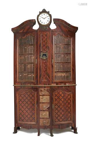 ϒ A French kingwood, parquetry inlaid, and gilt metal mounted cabinet