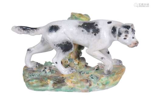 A Derby model of a pointer painted with black patches