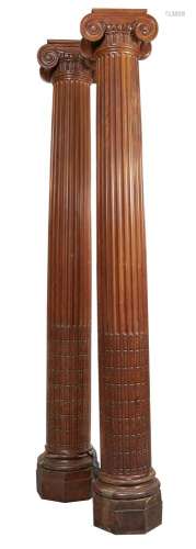 A pair of large carved stripped cedar columns
