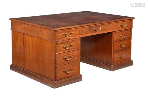 A mahogany and crossbanded partner's pedestal desk