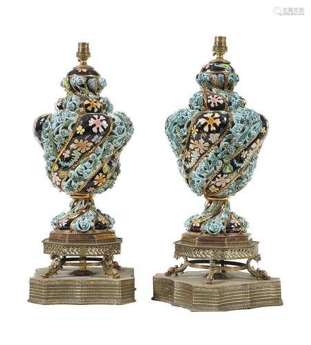 A pair of Continental porcelain and gilt metal mounted vase table lamps