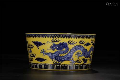 A Chinese Yellow Glazed Blue And White Dragon Basin
