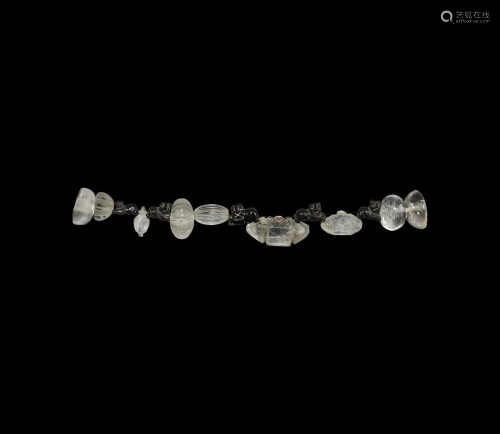 Early Islamic Rock Crystal Bead and Garnet Lion Bead