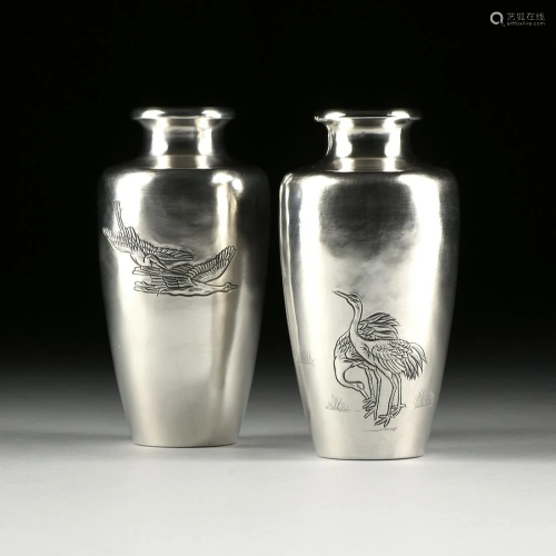 A PAIR OF WATANABE ZO STERLING SILVER REPOUS…