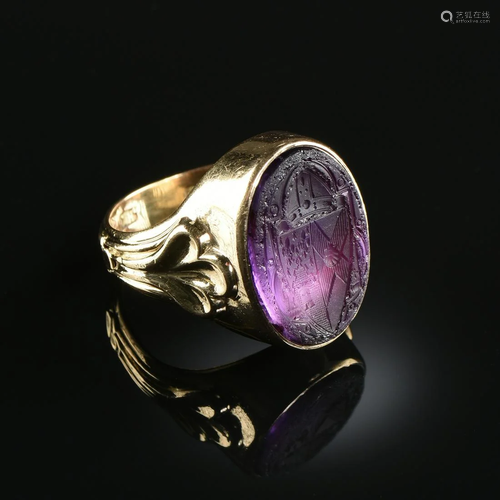 A YELLOW GOLD AND AMETHYST MEN'S SIGNET RI…