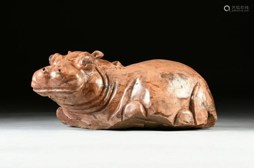 A CARVED TEAK BABY HIPPOPOTAMUS, MID/LATE 2…