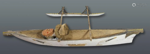 A small outrigger canoe used for ceremonies, probably