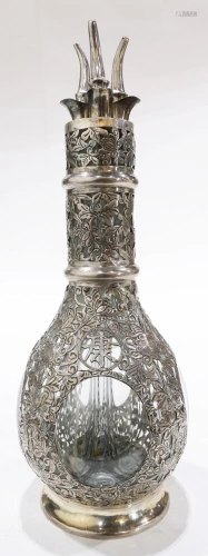 A Chinese Export silver overlay glass decanter