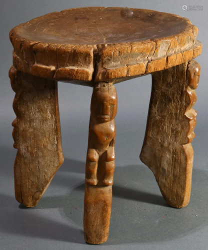 A West African carved wood stool