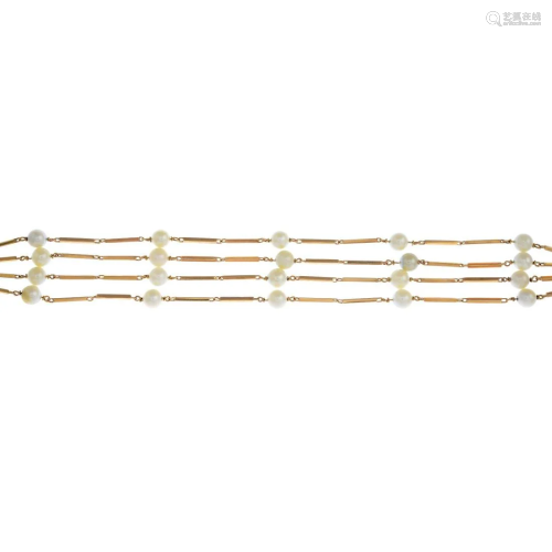 A cultured pearl multi-row bracelet. Length 20cms.