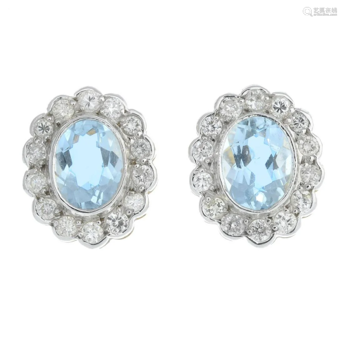 A pair of aquamarine and brilliant-cut diamond clu…