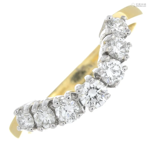An 18ct gold brilliant-cut diamond ring.Total diamond