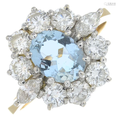 An 18ct gold aquamarine and diamond clu…