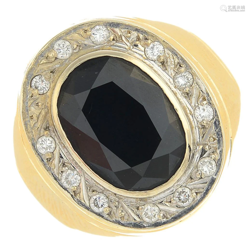 A sapphire and diamond dress ring. Estimate…