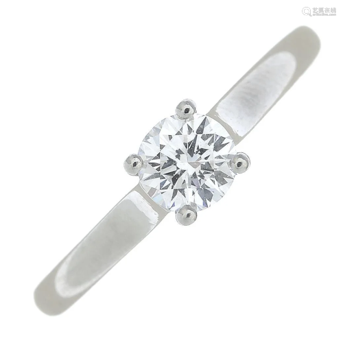 A platinum brilliant-cut diamond single-stone ring.With