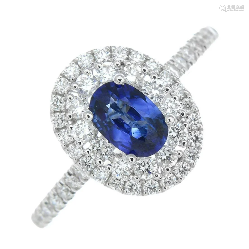 A sapphire and diamond cluster ring.Sapphir…