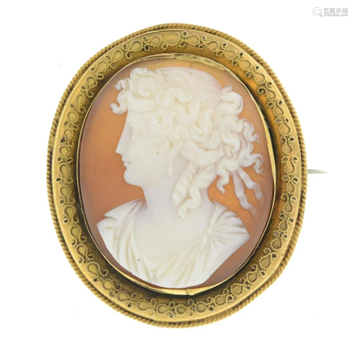 A late Victorian gold shell cameo brooch. Length