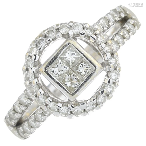 A vari-cut diamond ring.Estimated total diamond …