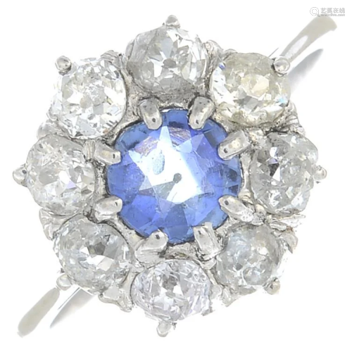 A sapphire and old-cut diamond cluster ring.Estimated