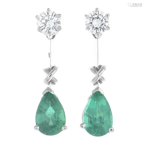 A pair of platinum emerald and diamond earring…