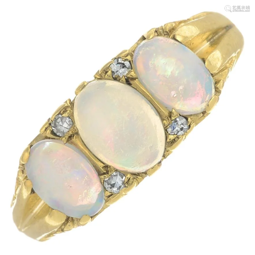 An opal and diamond ring.Estimated total diamond …