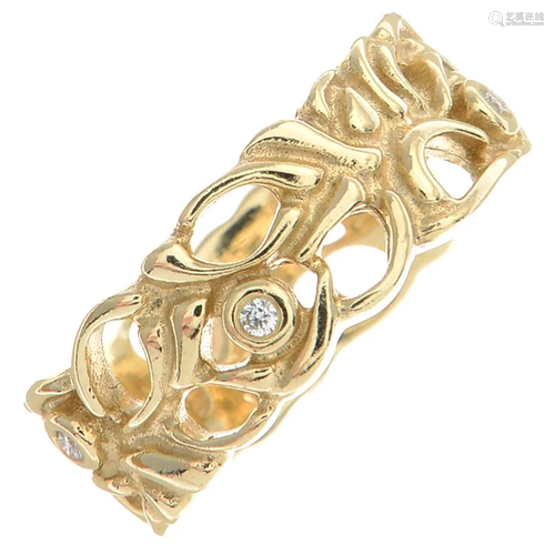 A 14ct gold diamond floral band ring, by